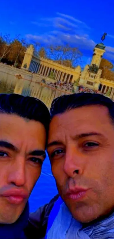 Two friends taking a bright selfie in a scenic park.