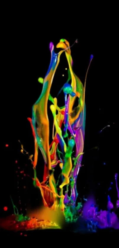 Vibrant paint splash on black background creating a colorful abstract art piece.