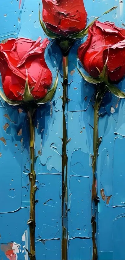 Three red painted roses on a blue textured background.