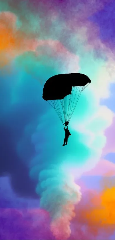 Silhouette of a parachutist against a vibrant, colorful sky with clouds.