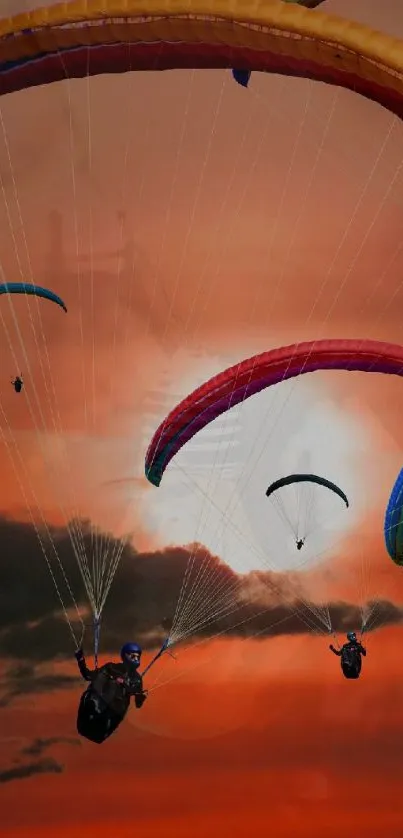 Paragliders soaring against a vibrant sunset sky.