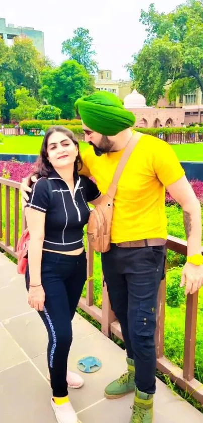 A vibrant couple walking in a lush green park.