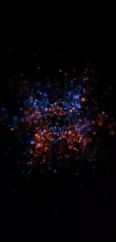 Vibrant burst of particles on black background wallpaper.