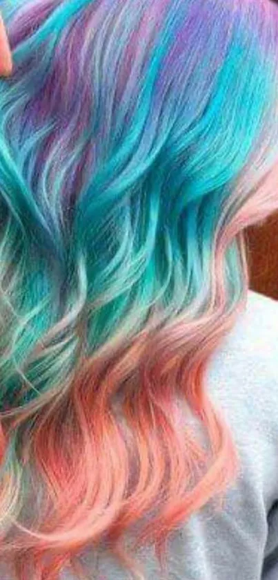 Vibrant pastel colored hair design in turquoise, pink, and purple hues.