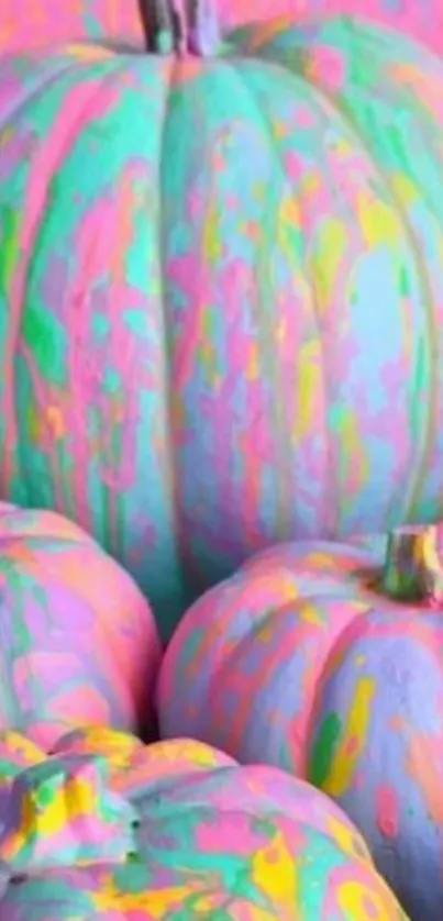 Vibrantly painted pastel pumpkins in a colorful abstract style.