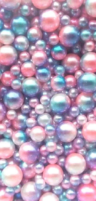 Vibrant pearl bubble wallpaper with pink, blue, and teal spheres.