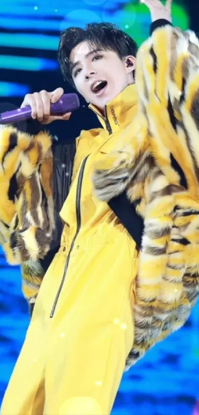 Performer in yellow suit with dynamic stage lighting.