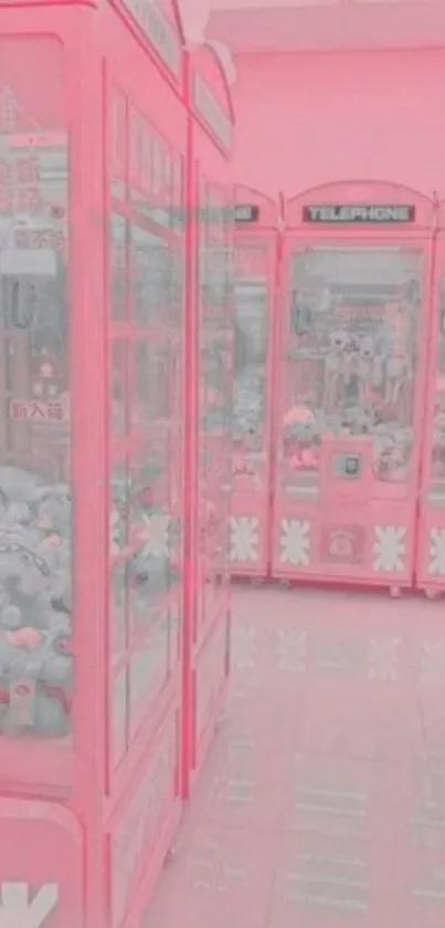 Vibrant pink arcade wallpaper with claw machines and plush toys.