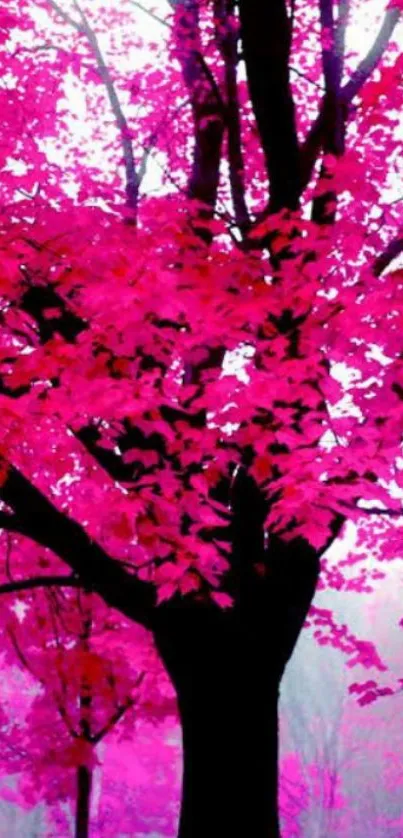 Vibrant pink tree with autumn leaves in a stunning mobile wallpaper.