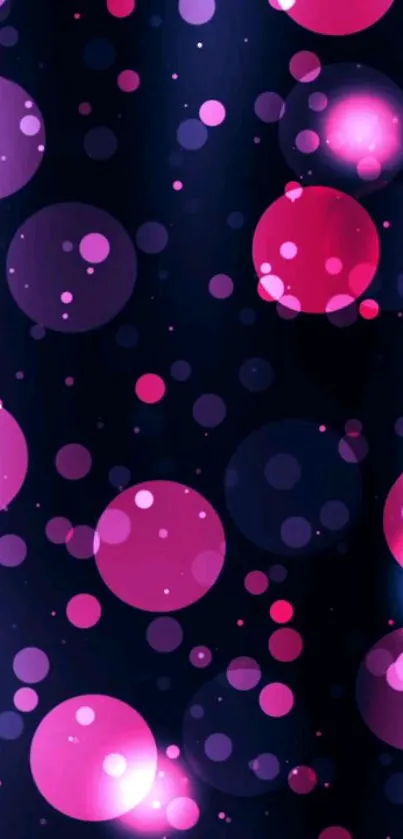 Vibrant pink and purple bokeh circles on a dark background.