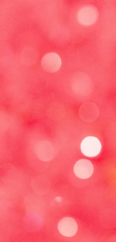 Vibrant pink bokeh wallpaper with soft glowing circles for phone screen.