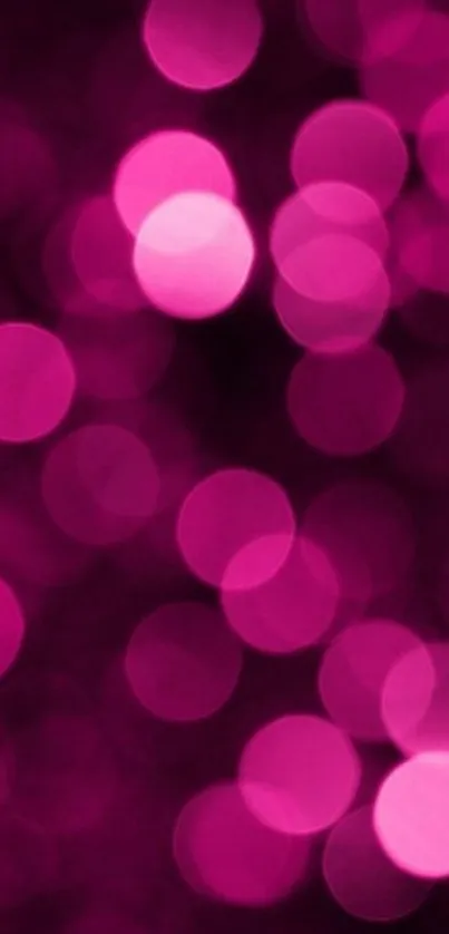 Vibrant pink bokeh mobile wallpaper with blurred circles.