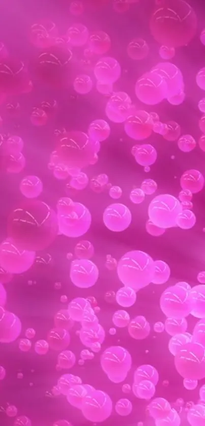 Vibrant pink bubble wallpaper for mobile screen.