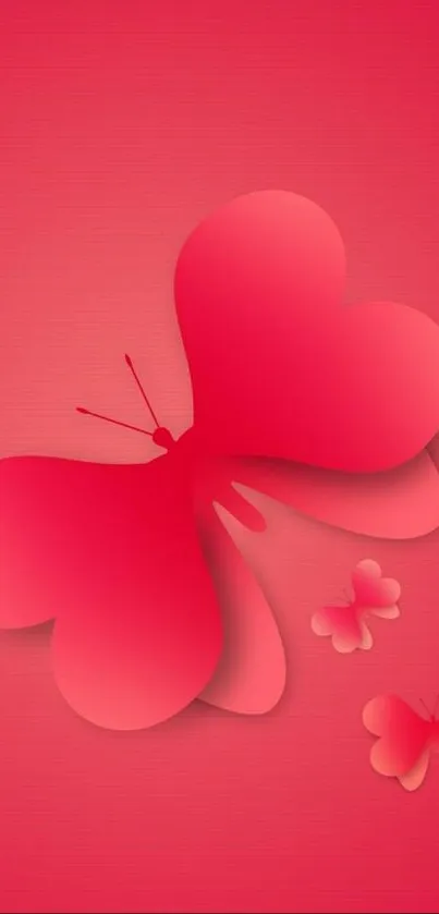 Vibrant pink butterfly with heart-shaped wings on a mobile wallpaper.