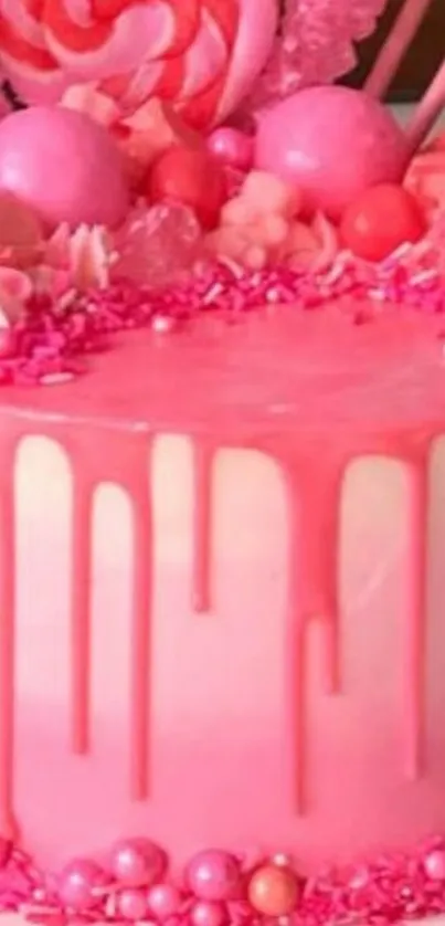 Vibrant pink candy cake with decorations.