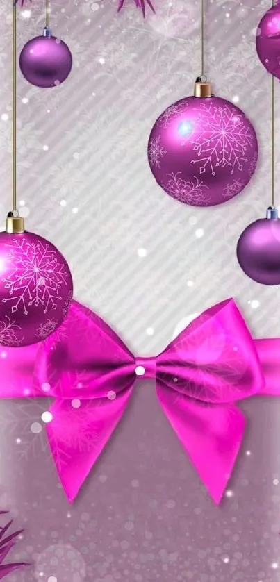 Vibrant pink wallpaper with Christmas ornaments and a festive bow.