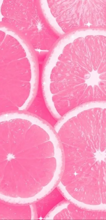 Pink grapefruit slices wallpaper, vibrant and fresh.