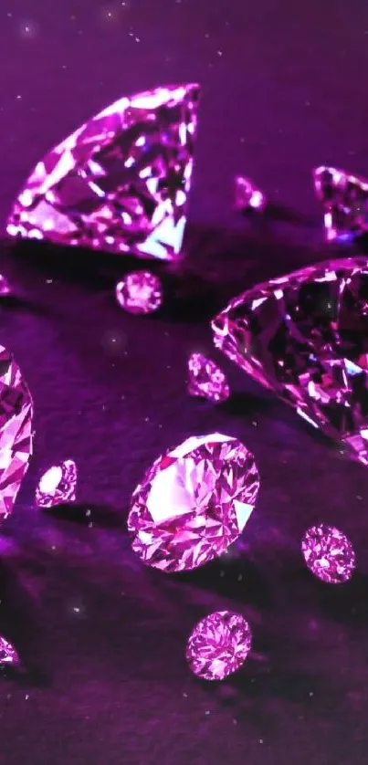 Vibrant pink diamonds on dark background.