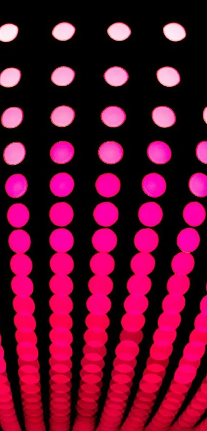 Vibrant pink dotted pattern mobile wallpaper.