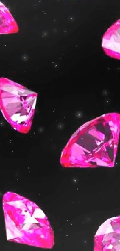 Scattered vibrant pink diamonds on black background mobile wallpaper.