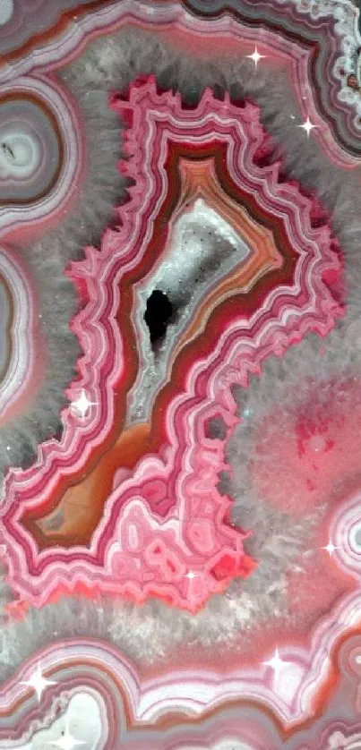 Vibrant pink geode with intricate patterns.