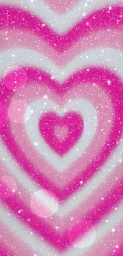 Vibrant pink heart wallpaper with sparkling effects and glowing patterns.