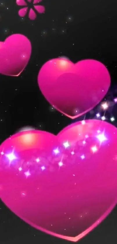 Vibrant pink heart wallpaper with glowing stars on a dark background.