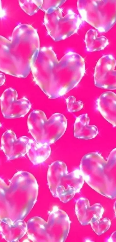 Mobile wallpaper with glossy hearts on hot pink background.