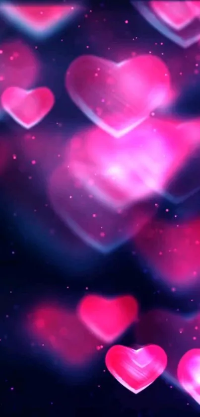 Glowing pink hearts on dark background wallpaper.