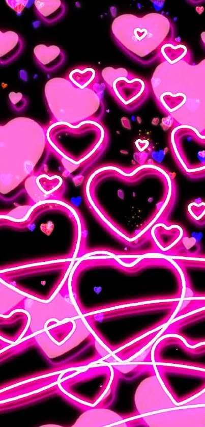 Neon pink hearts on a dark wallpaper background.