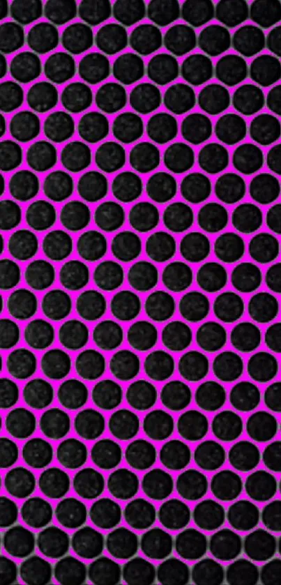 Vibrant pink and black hexagonal pattern wallpaper.