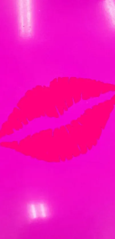 Vibrant pink lips on a stylish wallpaper background.