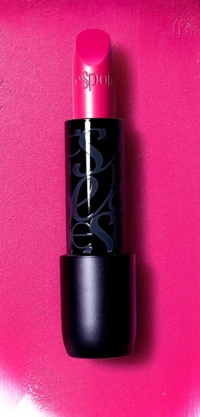 Vibrant pink lipstick on stylish background.