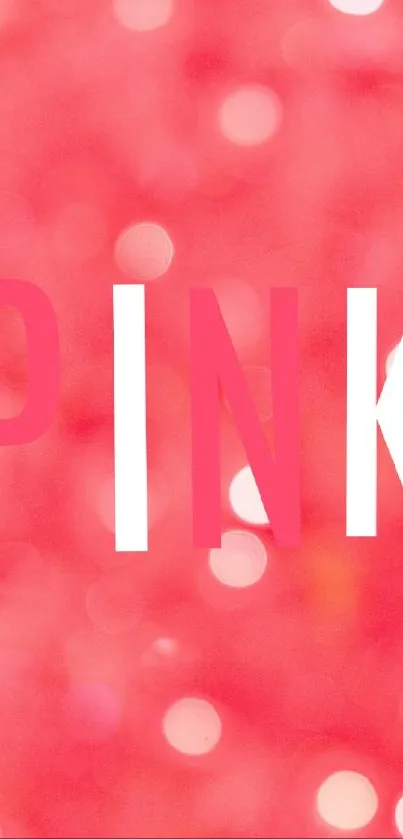 Vibrant pink wallpaper with bokeh and bold letters.