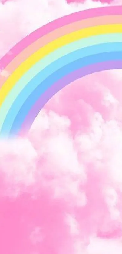 Pink clouds with a vibrant rainbow arched above, creating a whimsical scene.