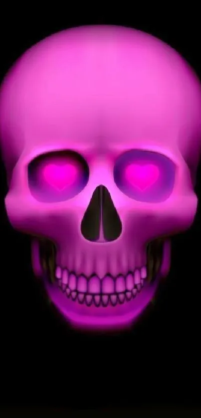 Neon pink skull with heart-shaped eyes on black background.