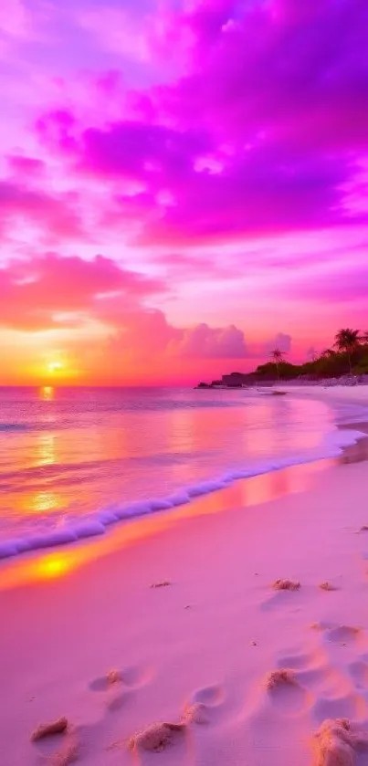 Vibrant pink sunset beach with sand and ocean view.