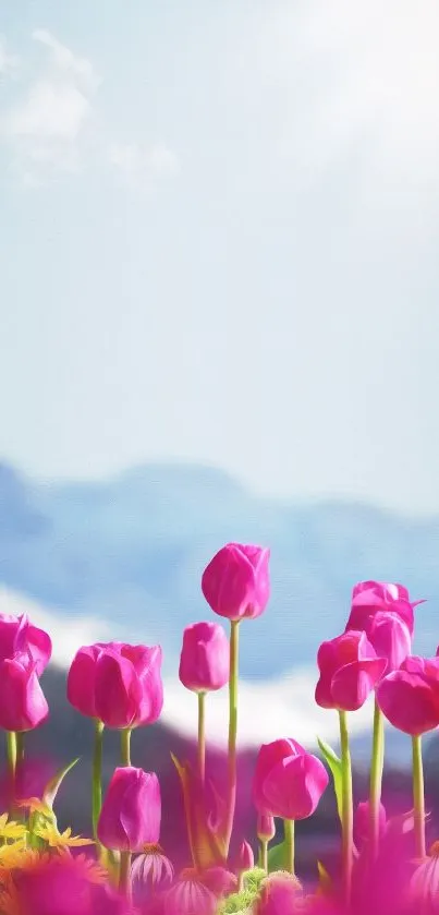 Vibrant pink tulips with mountain and sky background.