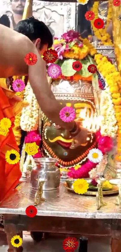 Hindu pooja ritual with vibrant decorations and marigold flowers.