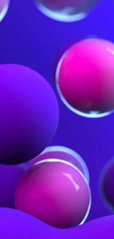 Vibrant purple and pink spheres on a blue background wallpaper.