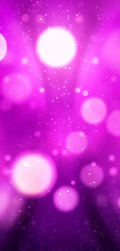 Purple bokeh wallpaper with vibrant light effects.