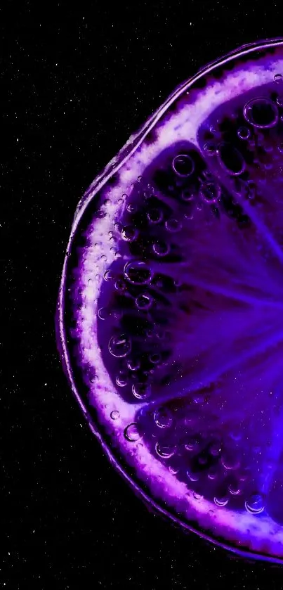 Vibrant purple citrus slice with neon glow on black background.