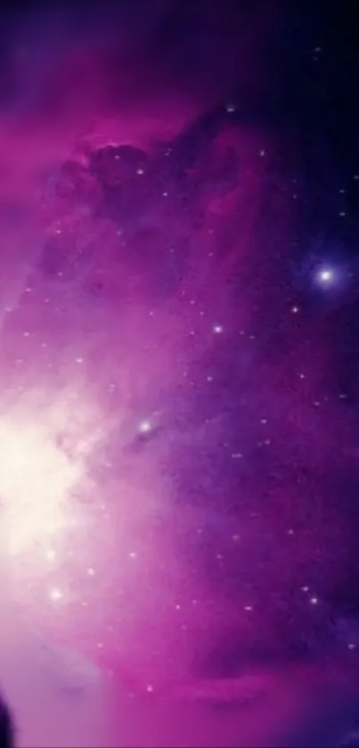 Purple galaxy wallpaper with stars and cosmic clouds.