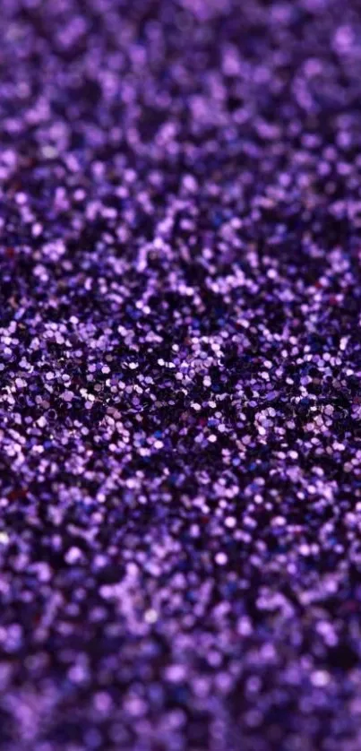 Vibrant purple glitter wallpaper for mobile with sparkling texture.