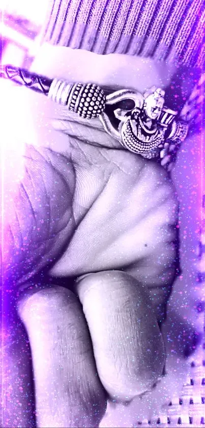 Hand with a purple glowing bracelet, stylish and artistic wallpaper.