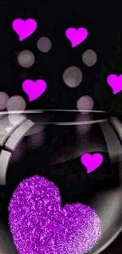 Purple hearts floating in a glass bowl on dark background