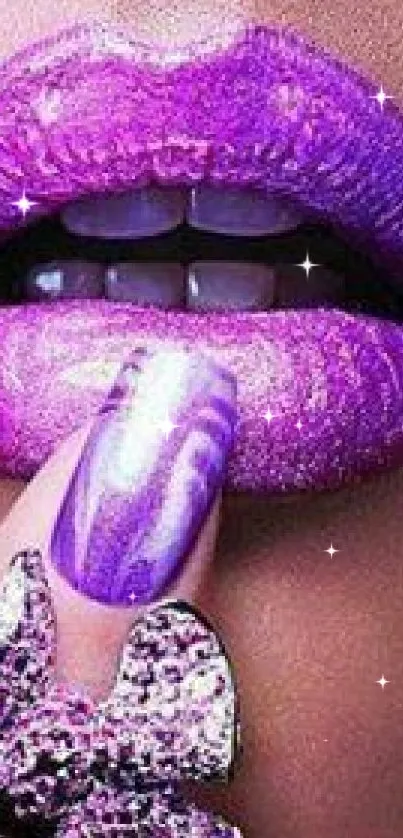 Close-up of vibrant purple lips and a glamorous nail design.