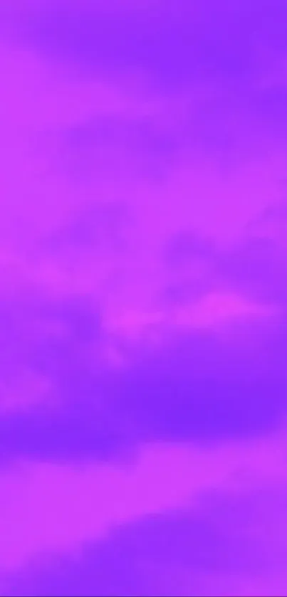 A vibrant purple sky with soft clouds wallpaper.
