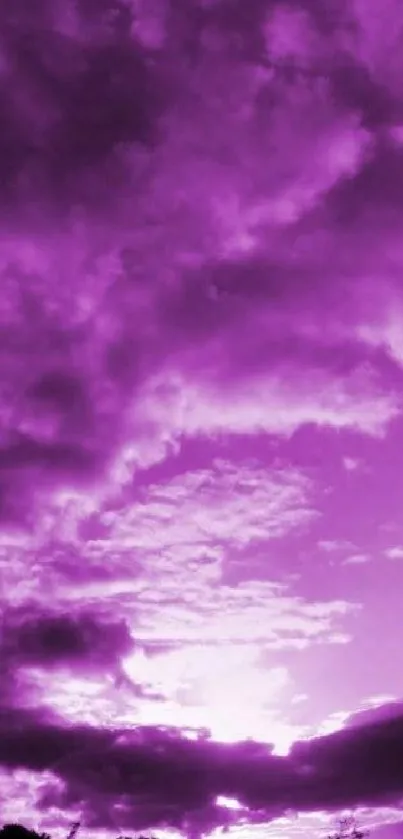 Purple sky with dramatic clouds at sunset, perfect for mobile wallpaper.