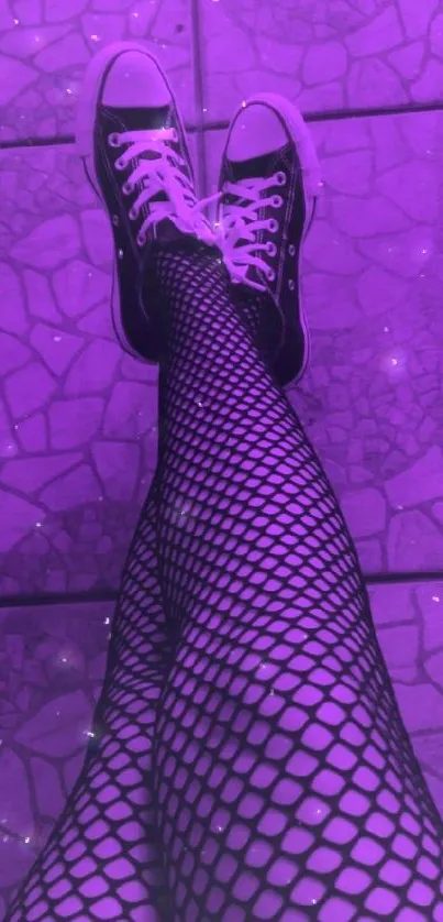 Purple sneakers with fishnet stockings on tiled floor.